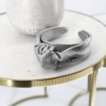 KNOT HEADBAND IN METALLIC LEATHER